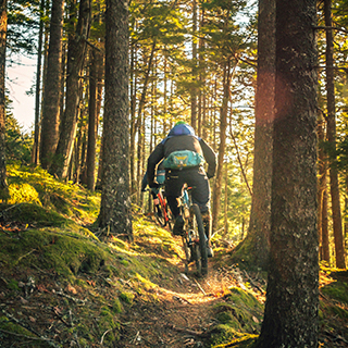 A man on a downhill track - by Tim Foster