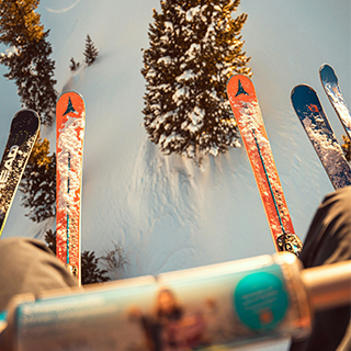 Skiing people on lift - by Andri Klopfenstein