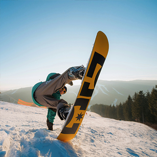 A man performing tricks with snowboard - by Sergey Mikheev