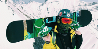 A man with snowboard - by Max Kukurudziak
