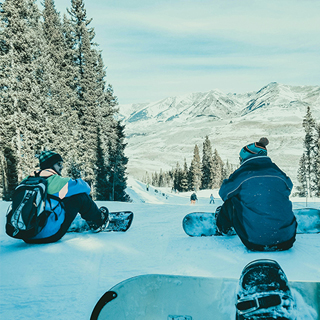 Snowboard group sitting on the track - by Tyler Domingue